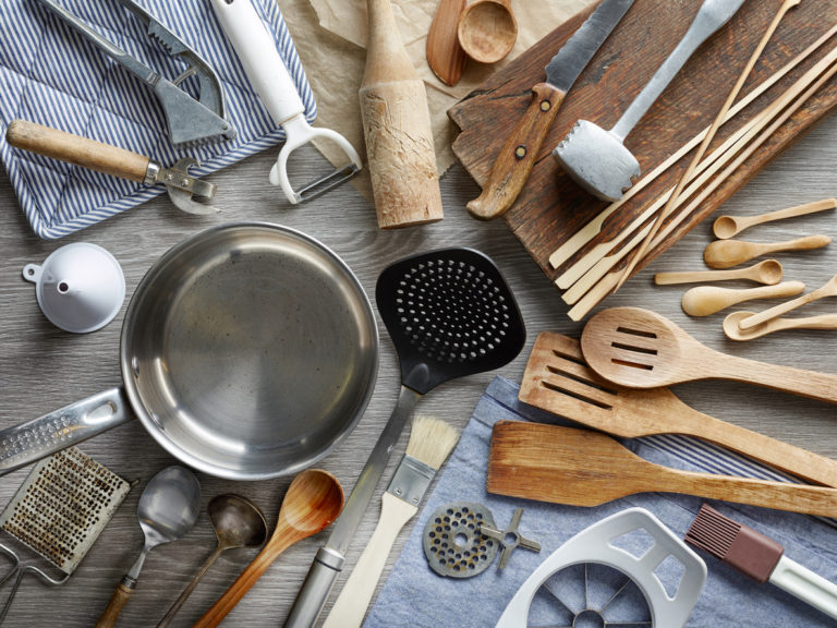 cooking utensils laid out on table